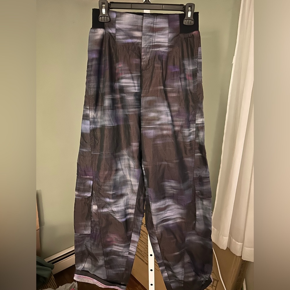 Free People Cargo Pants with rolled bottoms that has logo